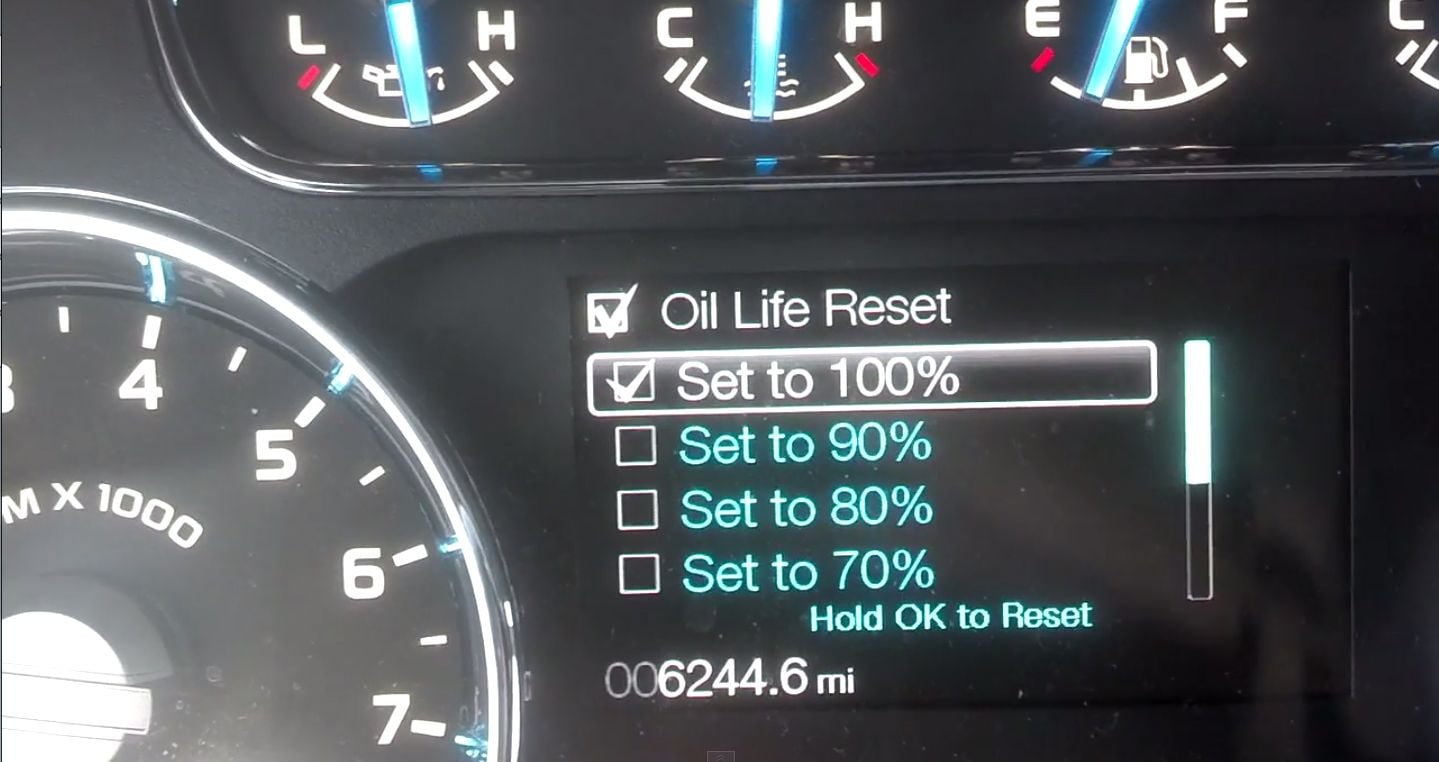 oil life percentages. Release the button when oil life is set to 100% ...