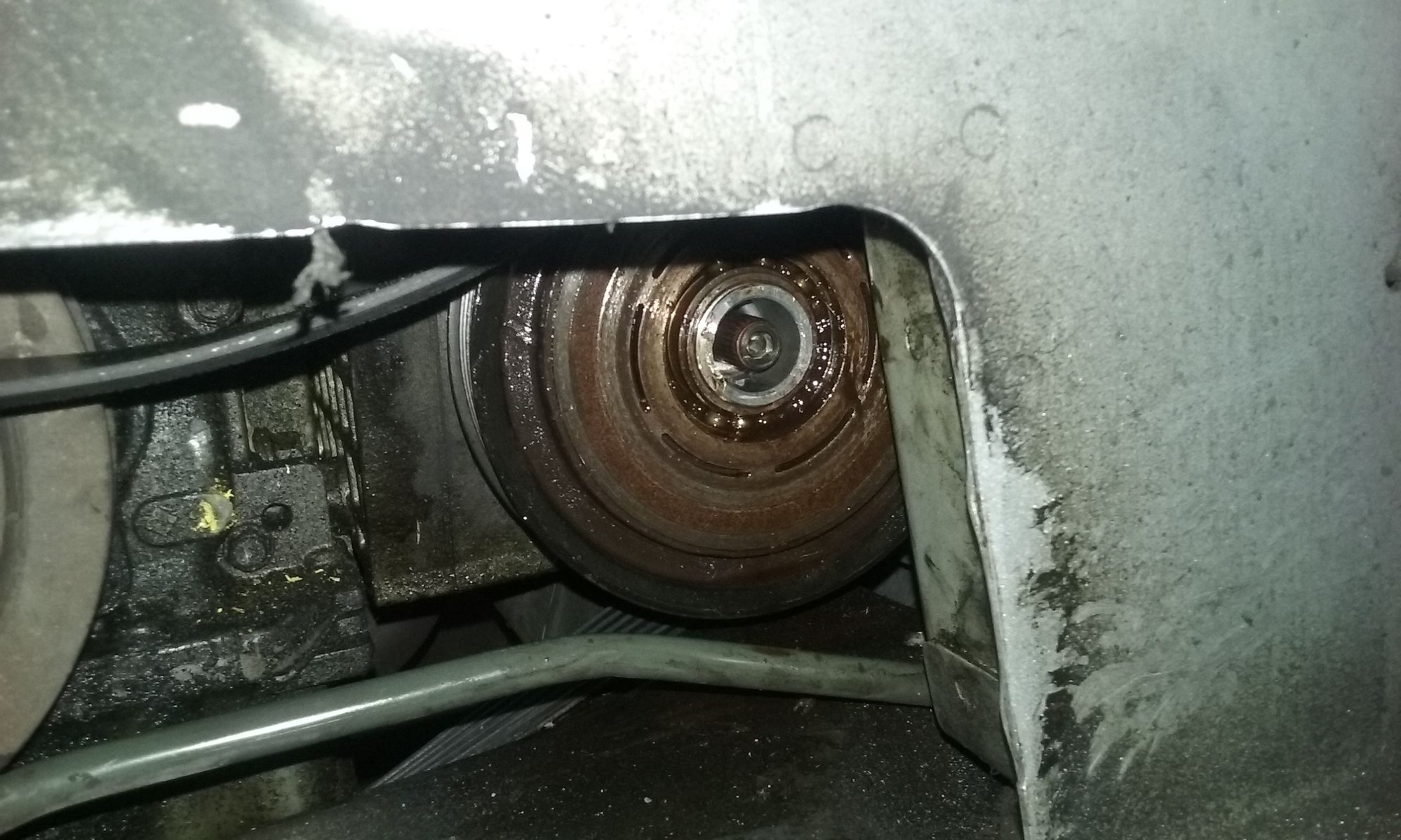 ... from the front and try to lower the compressor? There are instructions  above for an MDX but I'm not sure whether the steps would be the same for a  TL.