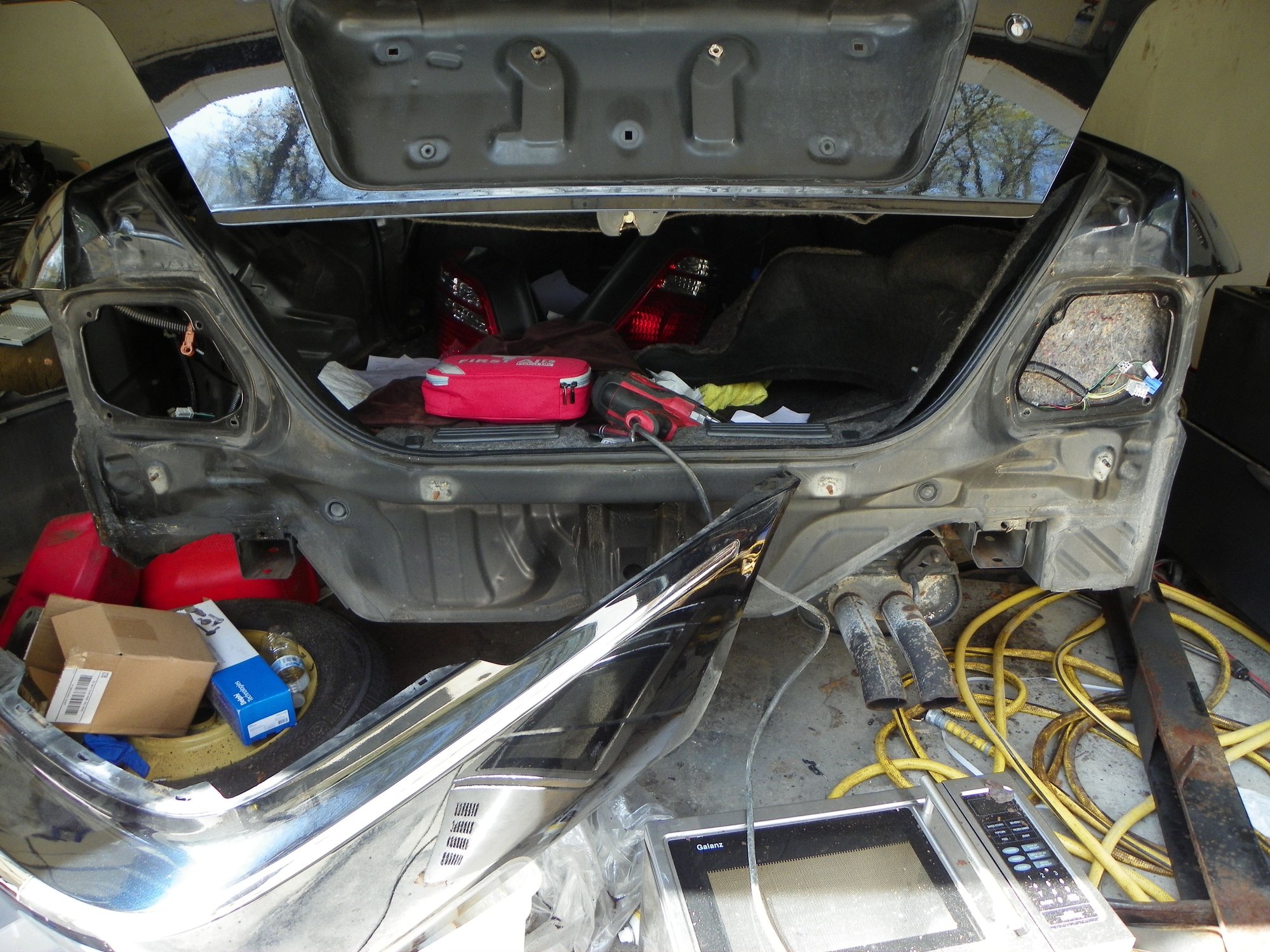 Crash bar removed. Plz ignore the mess. Gonna spend the afternoon cleaning it.