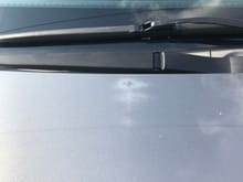 This is the spot on the top center of the hood that is fading, I think it’s the clear coat, right? I don’t exactly know how to fix this, 
Thanks