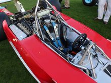 Not as monocoque as some English cars but the lower section is structural sheet aluminum and t the upper and rear is tubular.  The motor is semi-stressed member