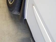 left front, very small gap towards bottom
