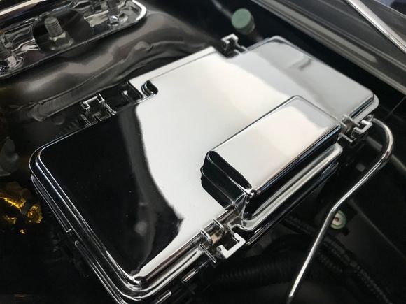 Chrome plated fuse box cover. 