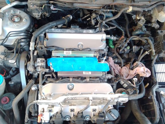 Reinstalled valve covers. TIP: use a torque wrench to torque it to specs (8.7ft/lbs for valve cover). I didn't and snapped one bolt. My heart sank. There's no way I can extract it, so I just put Permatex grey gasket maker all along the valve cover and around the snapped bolt.