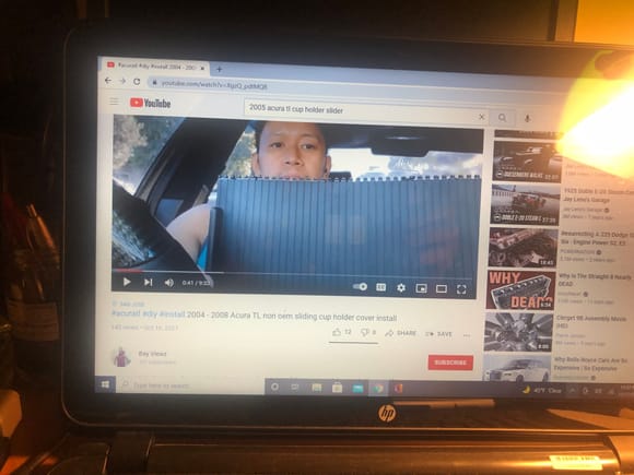 Youtube video shows a guy replacing his 3G TL center console cup holder with a very similar cover designed for a Land Rover / Range Rover Sport.