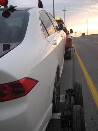 A snapshot of my brother getting my car impounded in Toronto.