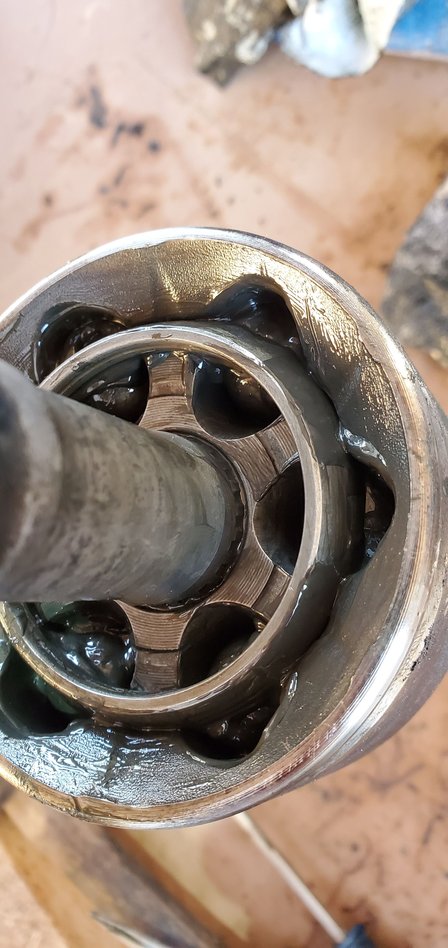 2008 Polaris Sportsman 500 HO EFI. How to remove CV from axle