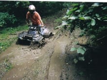 Me and my quad in some mud!See i have a quad!!!!!!!