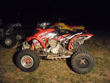A picture of it with my black KFX450R wheels on back.
Looks better than I thought it would.

I was really just trying stuff out on the 450R though...