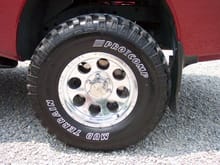 2006 Nissan Titan Crew Cab SE 4x435x12.50-17&quot; Pro Comp Mud Terrains on17x9&quot; Xtreme Alloy 1079 Polished Aluminum Wheels