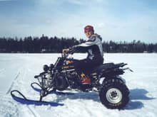 Jason on his Banshee with skis we built.                                                                                                                                                                