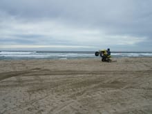 Doing a wheelie on the beach at Sand Lake 