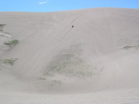 Look at the rider leaning forward, and attempt to soak in the scale and steepness of this dune at St Anthonies!                                                                                         