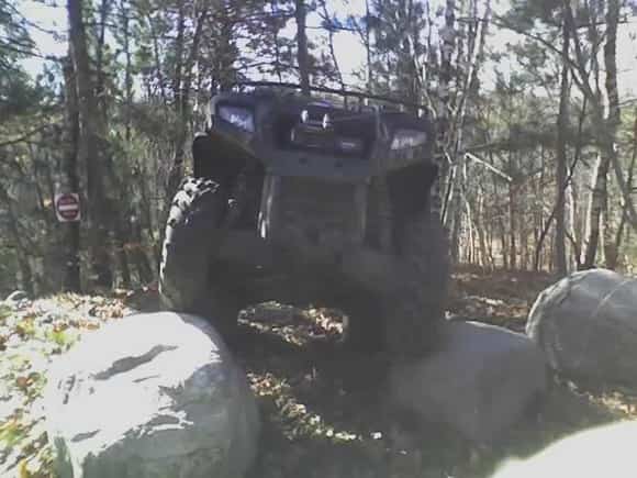 My buddy came up the hill next, and had to climb the last obstacle as well. The sp700    proves itself as it to climbs over also                                                                        