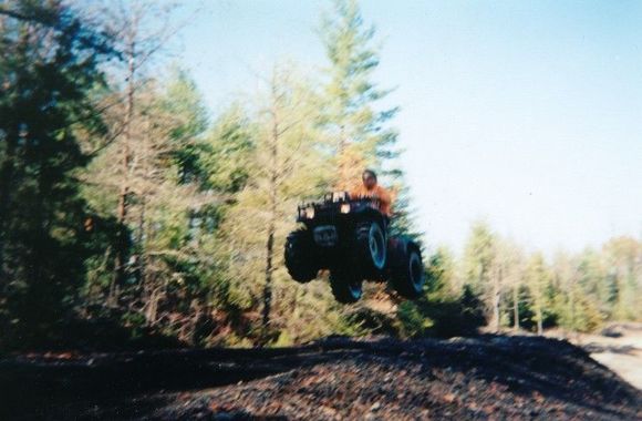 MY dad airing the foreman with the 28 inch 589's. The weird thing is it turns easier and lands softer with them.