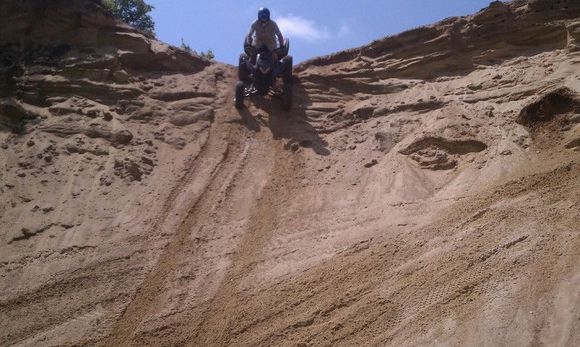 Tuleman dropping in from a huge sand bank.  Probably about 200 yards straight down.