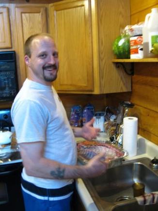 me (beergut) spicing up a few racks of baby-back pork ribs for friday nights dinner :)