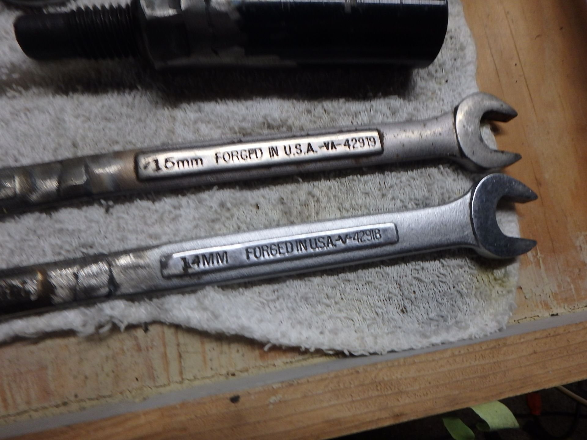 The other end of the wrenches. They are likely 18 inches in length so the have plenty of leverage.