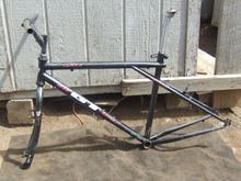 The main frame set with with post matching stem and bars is surprisingly light ten lbs or so.