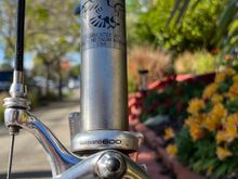 Fork crown with alloy OEM fork.