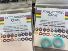 It's the small details that sometimes make a bike stand out.  I really wish I could find some dark blue rings like this.