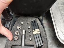 A seat bag labeled Vageur with built in tool array. The origin is unknown to me. Compartment above tools is normal space for tube or wallet.