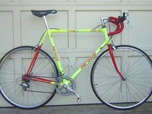 1992 Serotta Colorado II Coors Light Team Replica.  Yellow fading to white. 
The next year they switched to normal Corvette yellow.