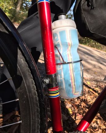 awesome. Works great. A smidge big for modern bottles, but looks super. 
Put a bit of gorilla tape under the clamp to protect the highly scratched up 42 year old frame. 