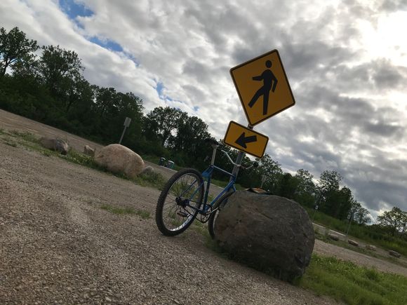 see that rock? It’s a metaphor for how the bike rides and it’s mass. 