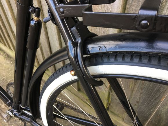 Original Rear Wheel captive Key Bike Lock refitted. Also in this Photo you can see one of the riveted Fender Repairs.