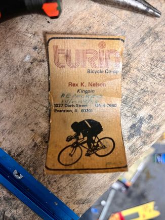Taking out the bottom bracket, this surprise. If I read it correctly, the BB was last packed in 1976 by Rex Nelson, "Kingpin" at Turin. Does anyone remember him?