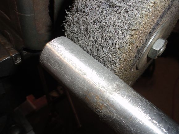 Seat post meets Mr. 3M buffing wheel that I normally use to refinish bottoms and faces of Titanium driver heads.  It is a bit aggressive and does remove about one  thousandth of an inch from the outer surface of the aluminum.