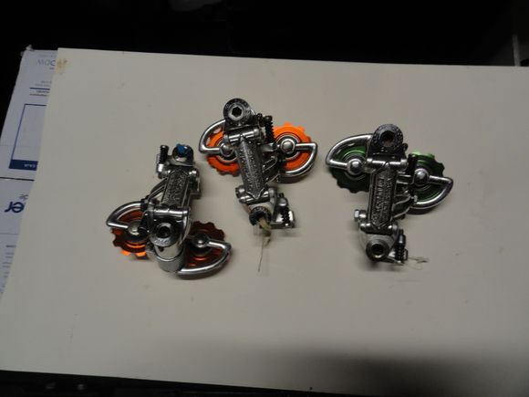 NR rear with replacement sealed bearing jockey pulleys.   Two orange and one green.  Completely reconditioned with new stainless steel adjuster screws.