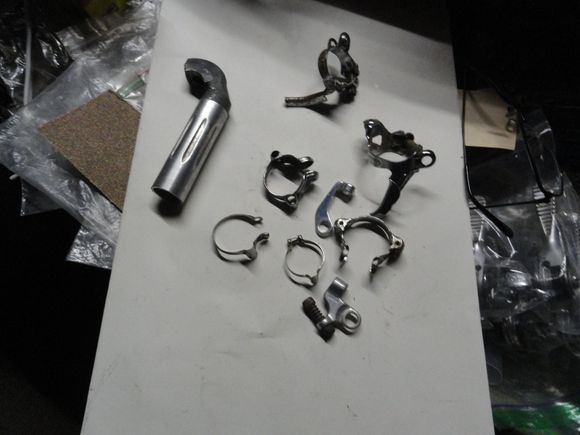 A handful of cable guides and clips, and some Campy Carnage to a super record seat post that will only work for a very "French fit".  And to top it off it is the rare 25.0 size.