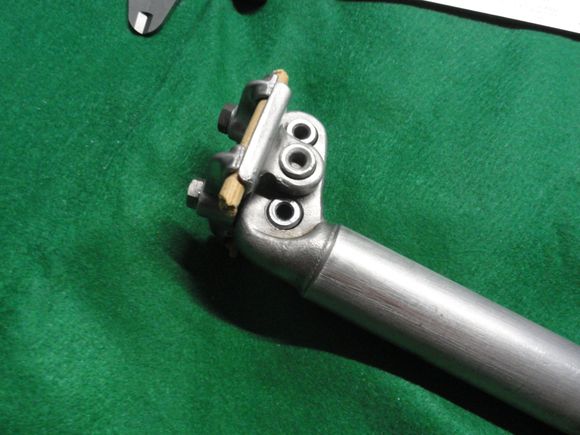 Has all the looks of the real thing but the parts are all different sizes than they should be. Bolt sizes and lower plate are different.