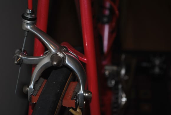 Is this a signature?  Most of my road bikes have these fabulous Monoplanor brakes