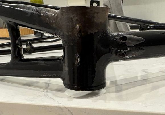 Internally routed derailleur cable exits at bottom Bracket