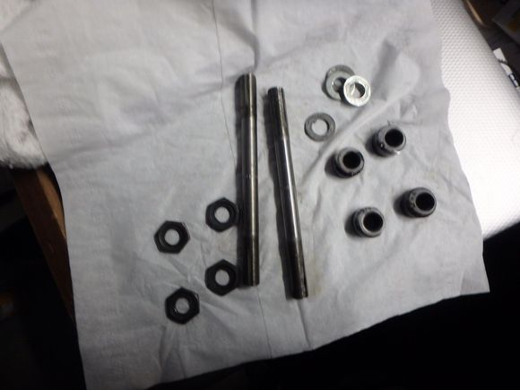 Lock nuts, axles, cones. and washers.