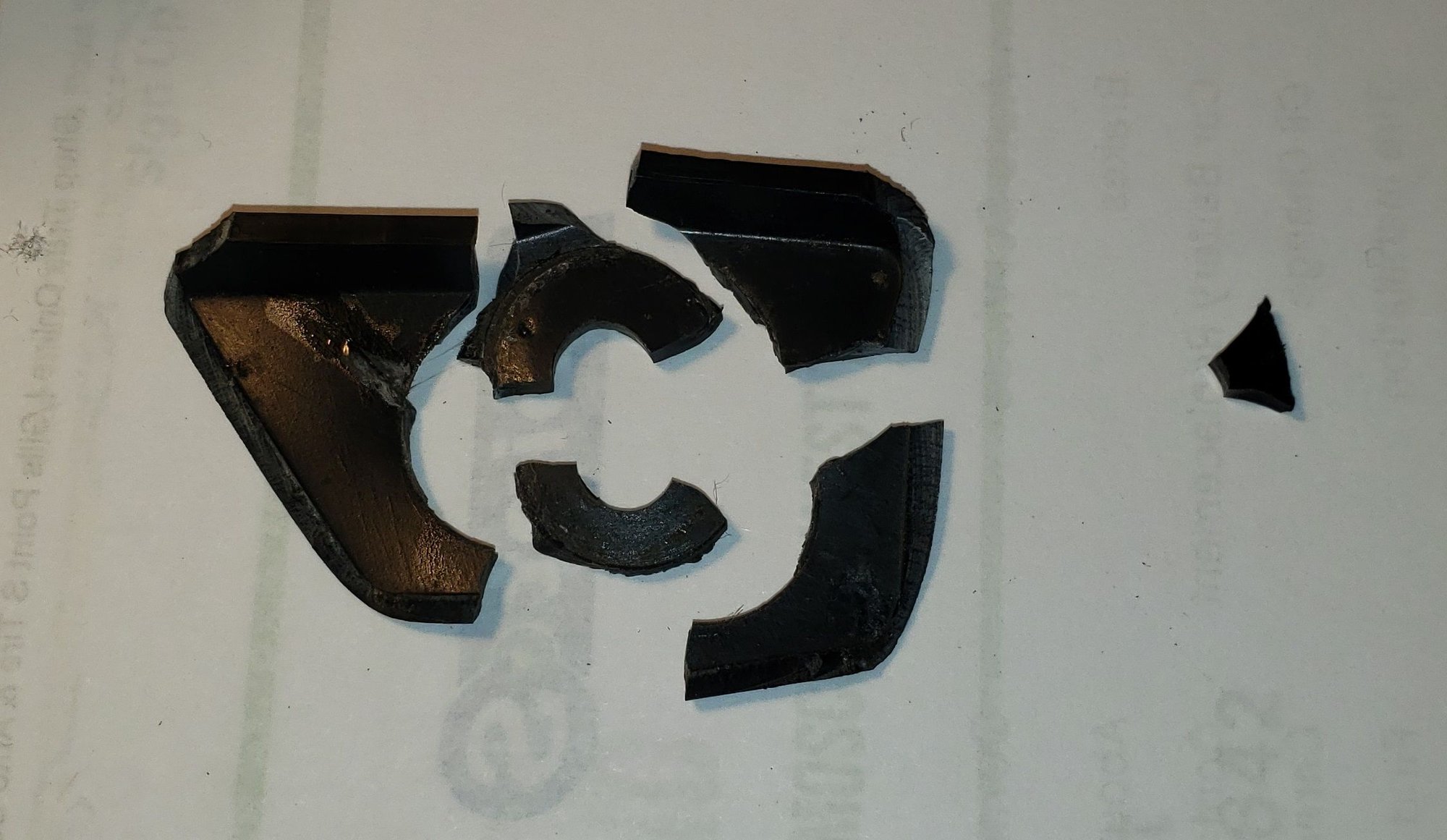 The broken front foot of the console.