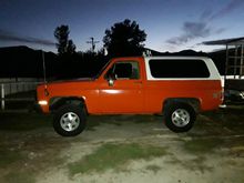 2002 Chevy K1500 p/u rims with 2"spacers to get the centerline back where it belongs and to miss the calipers. The paint is 1956 Case Tractor "Flambeau Red" - the white is kinda generic GM appliance white I think. 