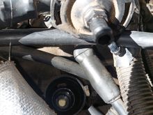 2001 chevy blazer 4.3 l.  What is this part?   It humms constintanly .  Its locatcation is behind the throttle body and to the right.  It looks as thou it goes into the intake.  Any clues would be greatful appreciated.   Thanks a bunch