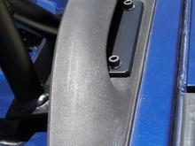 The base feet for mounting to the existing rail feet, copied from kiwiblazer. 3/16" sheet metal cut to shape of opening in existing rail feet and extended on the inside to accomodate the mount and support tube behind it. Plate must be bent slightly as the existing rail feet are not perfectly flat where the mounting bolts go in. You could use the existing torx bolts, but I opted to get a slightly longer allen-head style to accomodate the thickness of the plate and adding in a lock washer.