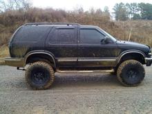 Went through a foot and a half deep mud puddle about 25ft long at 35mph......Broke a CV coming out of it. And now the entire engine compartment is covered in mud. Maybe I should have left the plastic skid plate on? lol