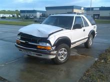 slide thru a light on a very rainy night, ran into a BRAND NEW dodge 1 ton (3500) megacab diesel! it had only 2k and was valued at 65k! damn, go big or go home. plus the mega cab was also considered totaled, lol