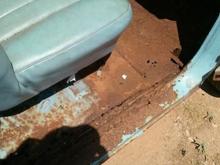 A little bit of rust on the passenger side floor pan..No biggy