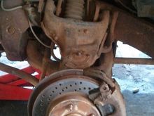 Front drilled rotors and doing some suspension mantainance