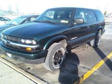 The day after painting the black semi-flat stripes. notice the rims are stock but painted. looks nice enough for me (again i did them right so they are immaculate). in the future some bigger tires with a 2" lift and a little wheel spacing will hurt my turn radius but improve my sway and traction on top of the more aggressive looks