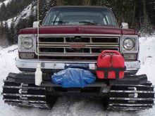 It has a 350 cid, turbo 350 trans, H/L range 
8500 lb Winch

Operating videos at:
http://www.youtube.com/watch?v=fDg5Cq145uU