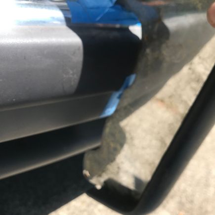 The very bottom that mounts somehow to the tow hook area