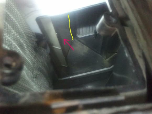 This is looking down through the access panel. The blend door is identified with the arrow and the axis of rotation of the blend door is identified with the yellow line.

The AC evaporator is to the left and in the upper right is the surface of the heater core. In this position I believe it would be full hot.